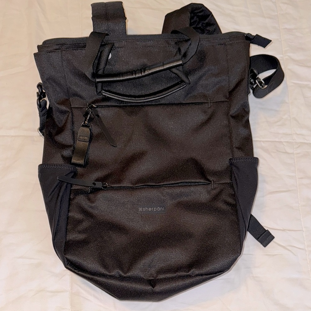 Sherpani convertible tote backpack. Black. Like new.